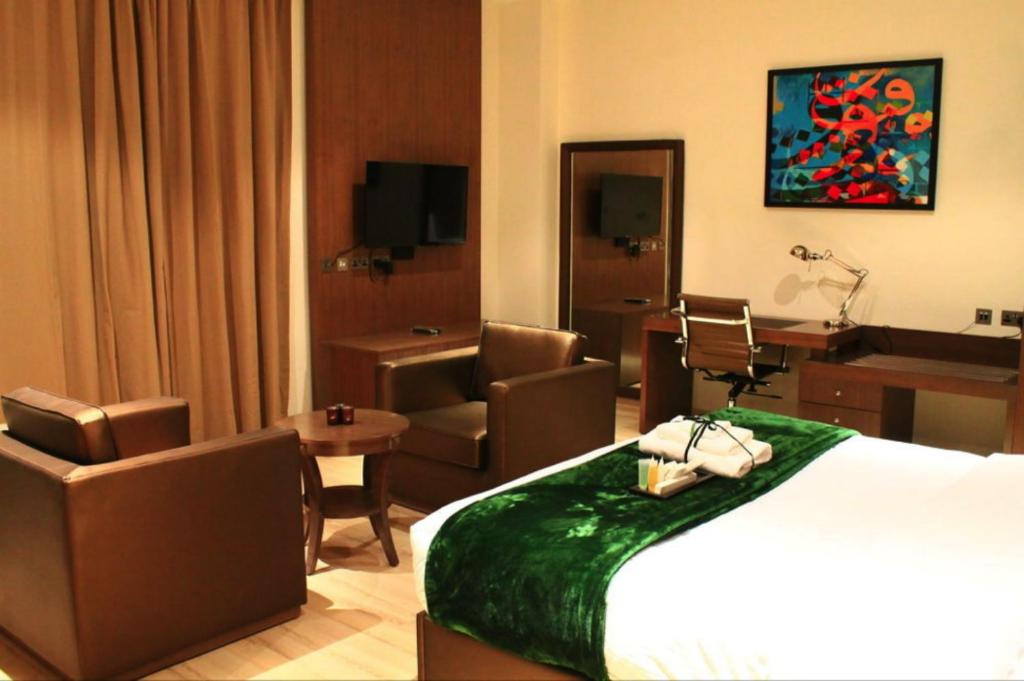 Katil atau katil-katil dalam bilik di Rawda Hotel