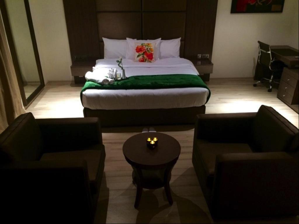 Katil atau katil-katil dalam bilik di Rawda Hotel