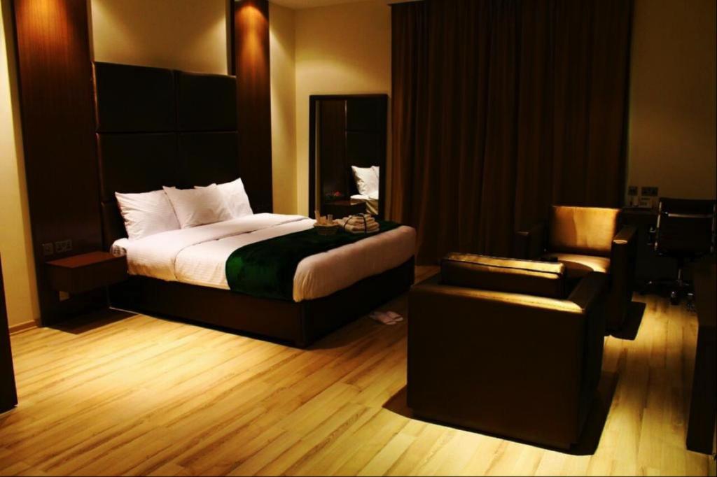 Katil atau katil-katil dalam bilik di Rawda Hotel