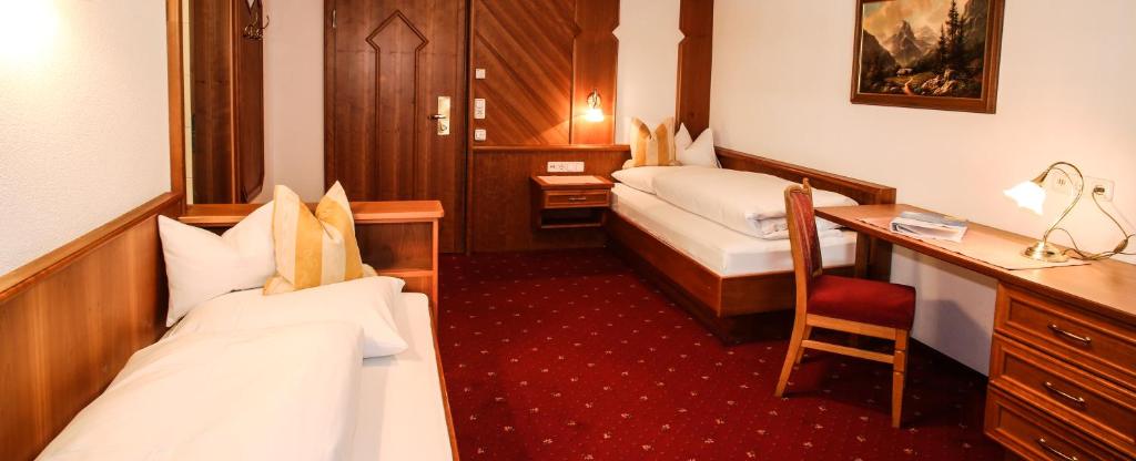 Posteľ alebo postele v izbe v ubytovaní Hotel Post Kappl