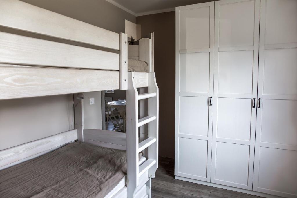 Posteľ alebo postele v izbe v ubytovaní Apartamenty Cicha by Royal Aparts
