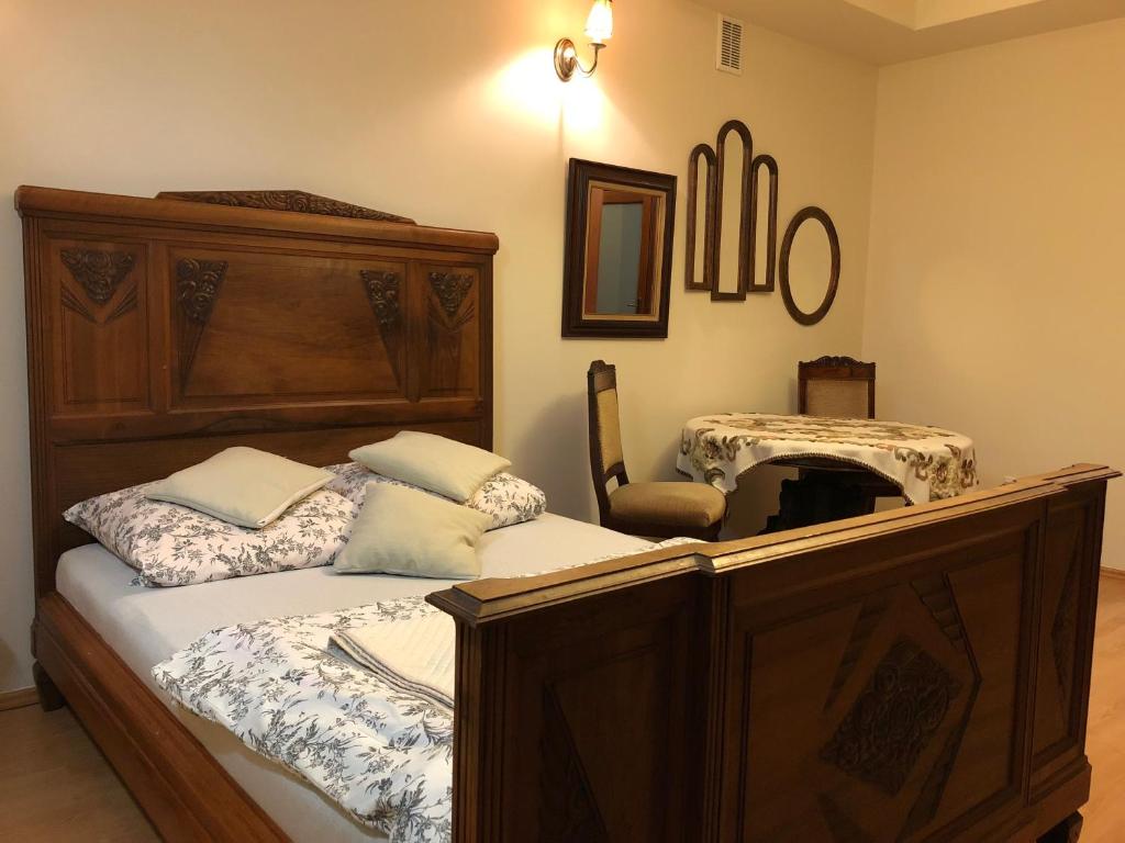Posteľ alebo postele v izbe v ubytovaní Apartament Perła Kartuz z sauną