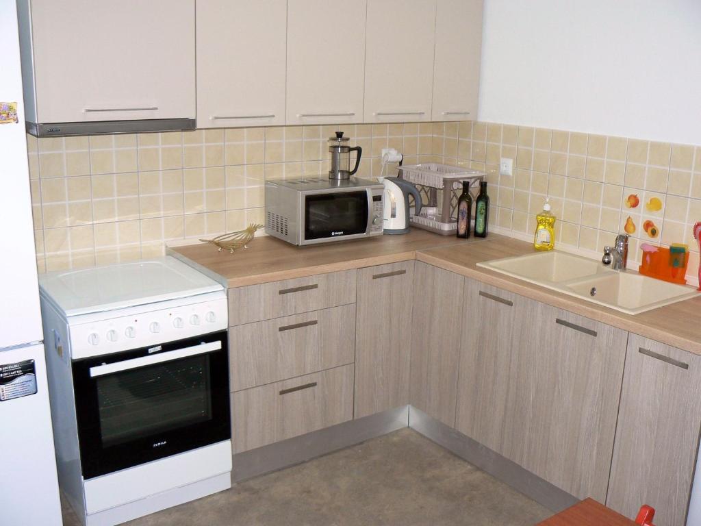 A kitchen or kitchenette at Alpha Omega (AΩ) Vintage Suite