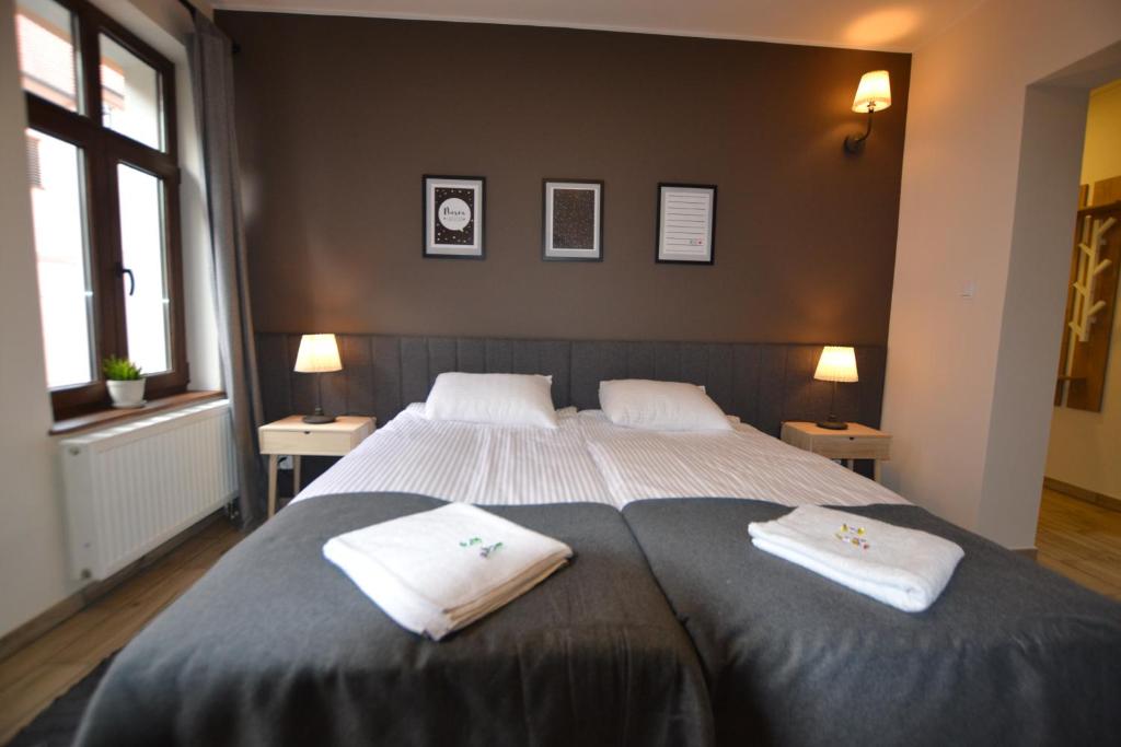 Кровать или кровати в номере SleepWell Apartments