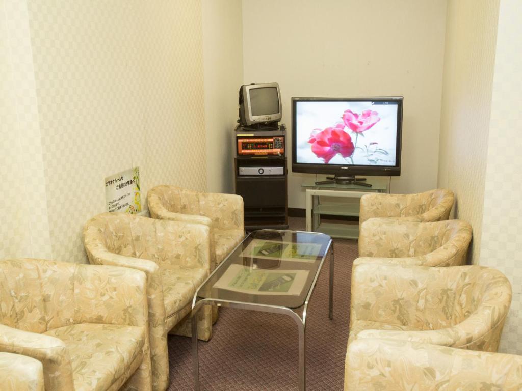 TV a/nebo společenská místnost v ubytování Kindayu