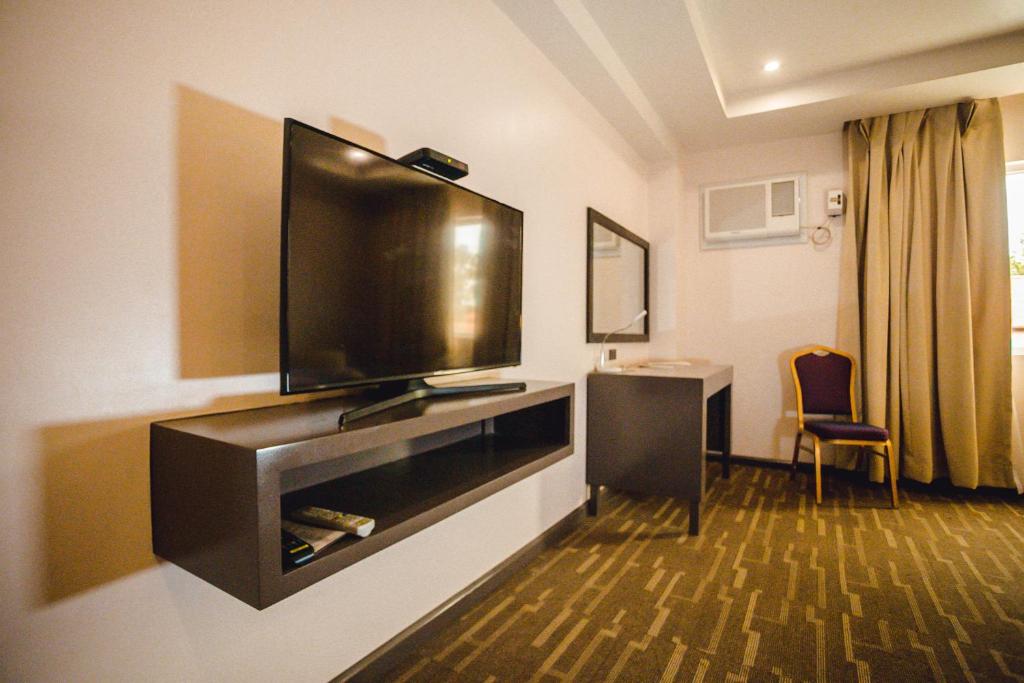 TV a/nebo společenská místnost v ubytování Butuan Grand Palace Hotel
