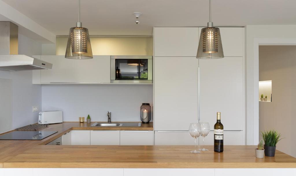 Kuchyň nebo kuchyňský kout v ubytování Apartamento Santa Barbara I
