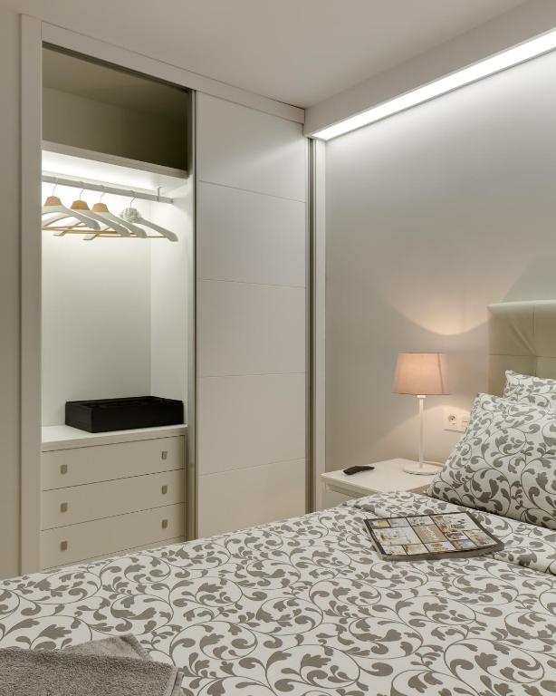 Postel nebo postele na pokoji v ubytování Apartamento Santa Barbara I