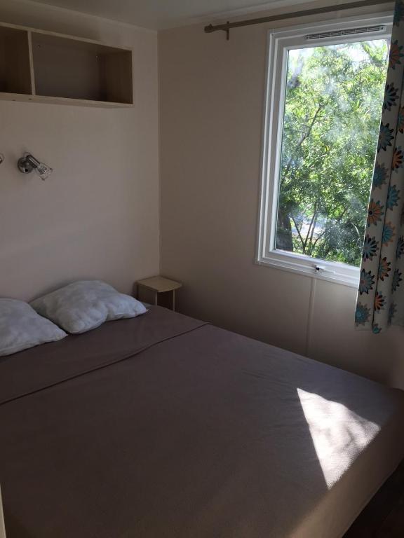 Postel nebo postele na pokoji v ubytování Camping Via Romana