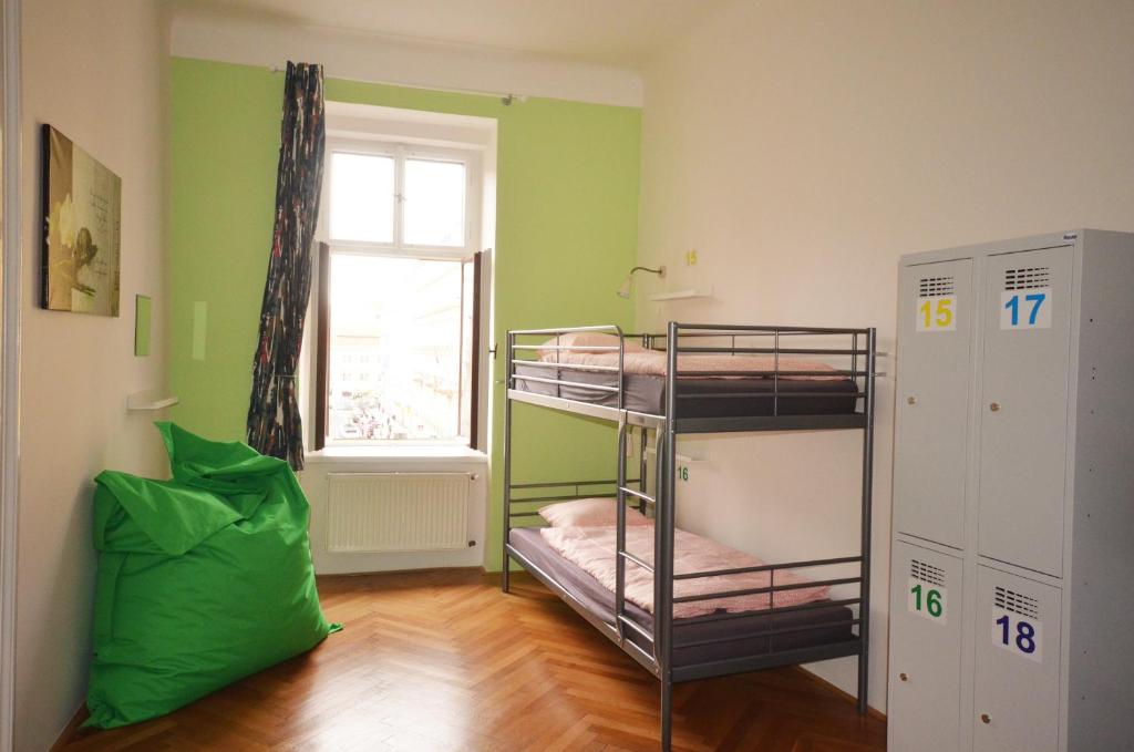Postel nebo postele na pokoji v ubytování Travel&Joy backpackers