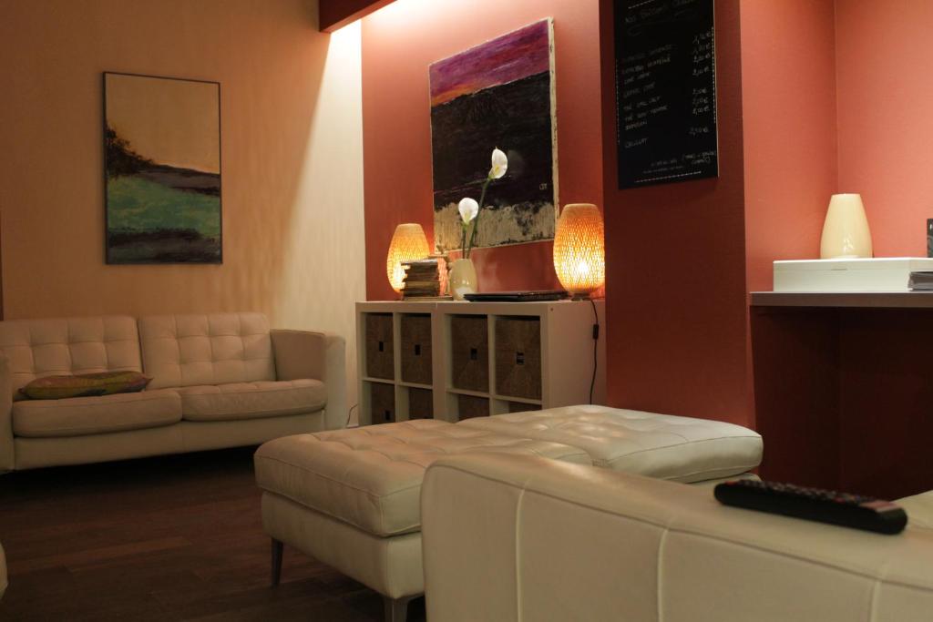 Posezení v ubytování Le Gouverneur Hotel