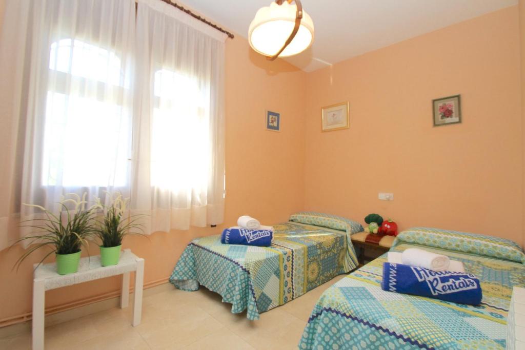 Postel nebo postele na pokoji v ubytování ARENDA Pino Alto Holiday Home Portofino