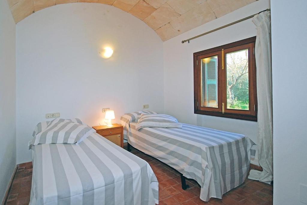 Postel nebo postele na pokoji v ubytování Villa Molinot