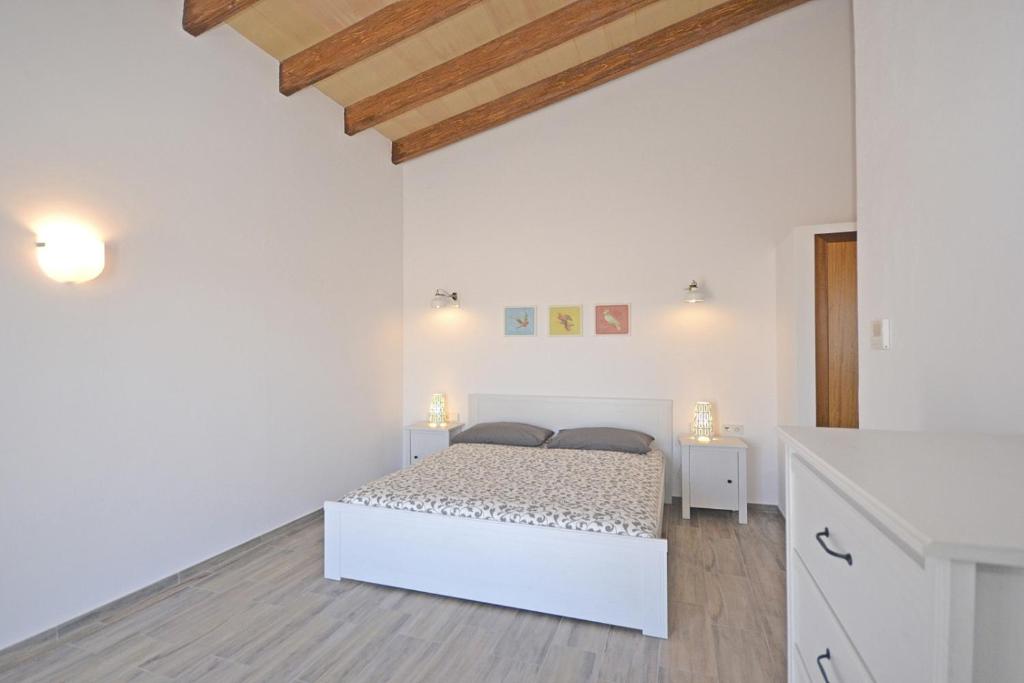 Postel nebo postele na pokoji v ubytování Villa Sion