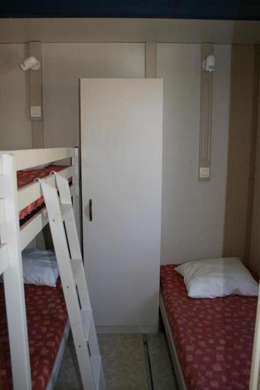 Postel nebo postele na pokoji v ubytování Camping Via Romana