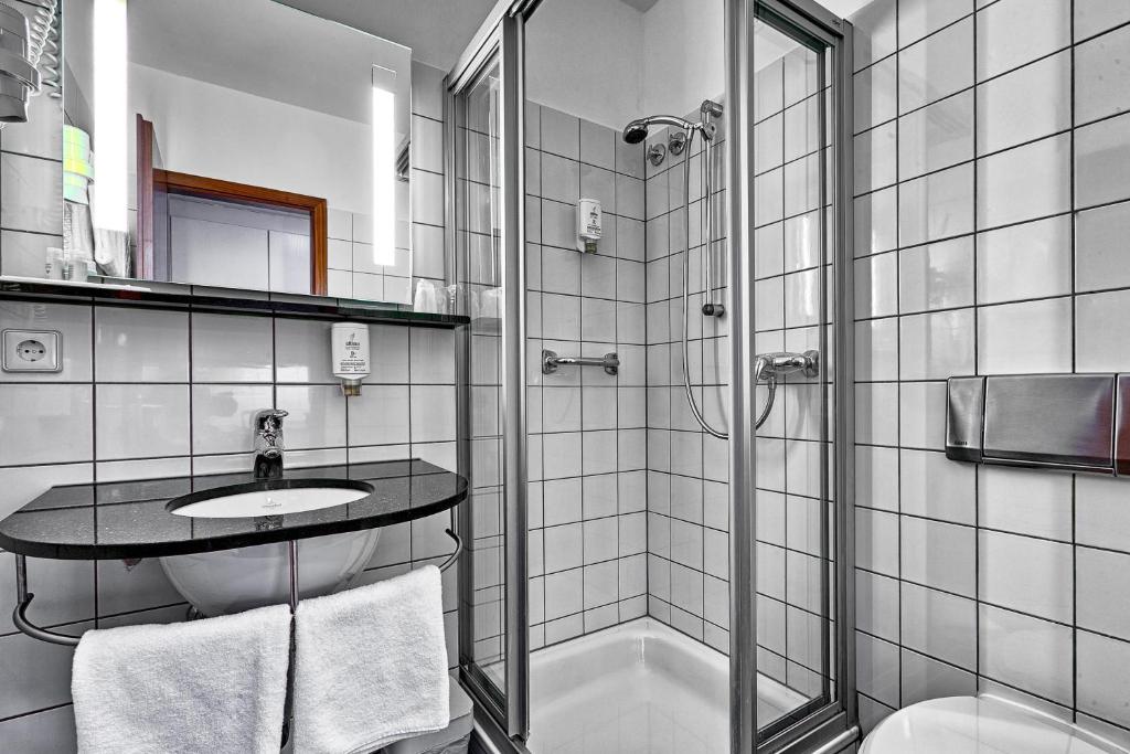 Koupelna v ubytování attimo Hotel Stuttgart***S