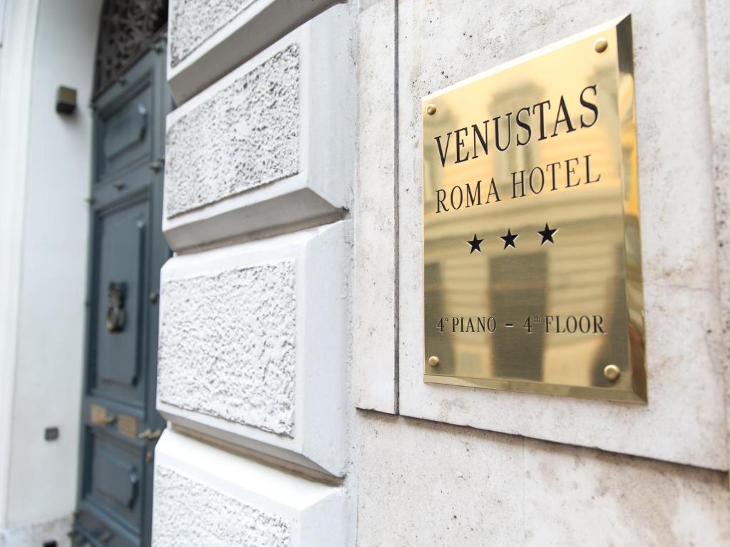 Certifikát, hodnocení, plakát nebo jiný dokument vystavený v ubytování Venustas Roma Hotel