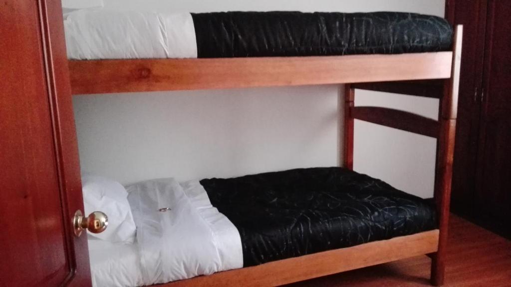 Postel nebo postele na pokoji v ubytování D'lujo