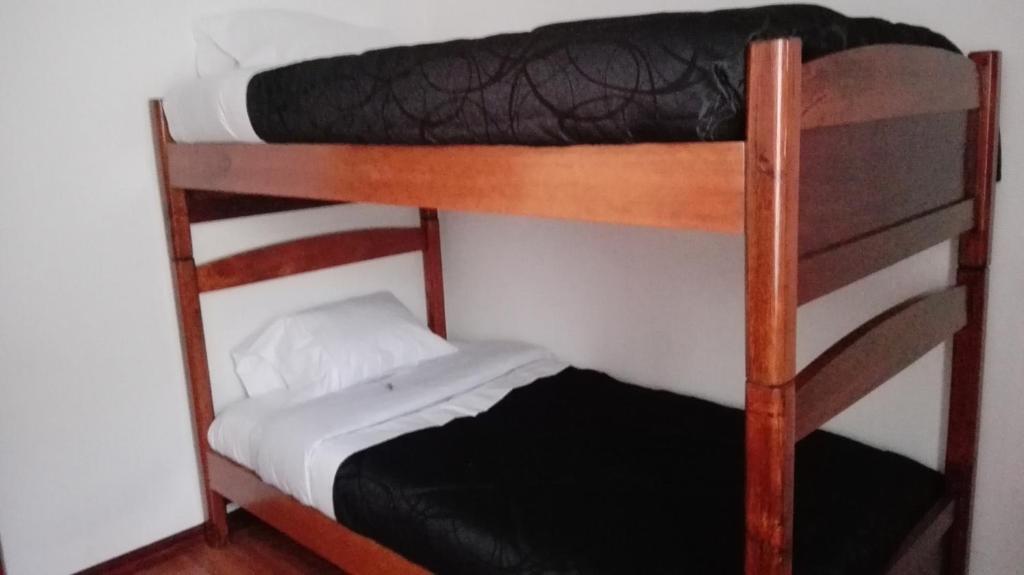 Postel nebo postele na pokoji v ubytování D'lujo