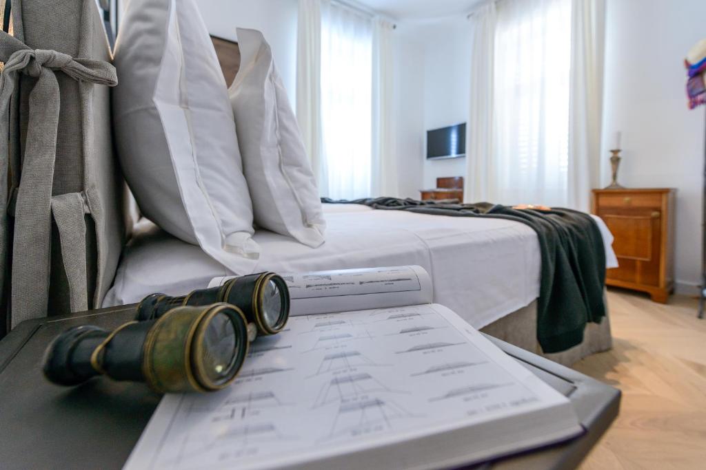 Postel nebo postele na pokoji v ubytování Villa Donna Paola