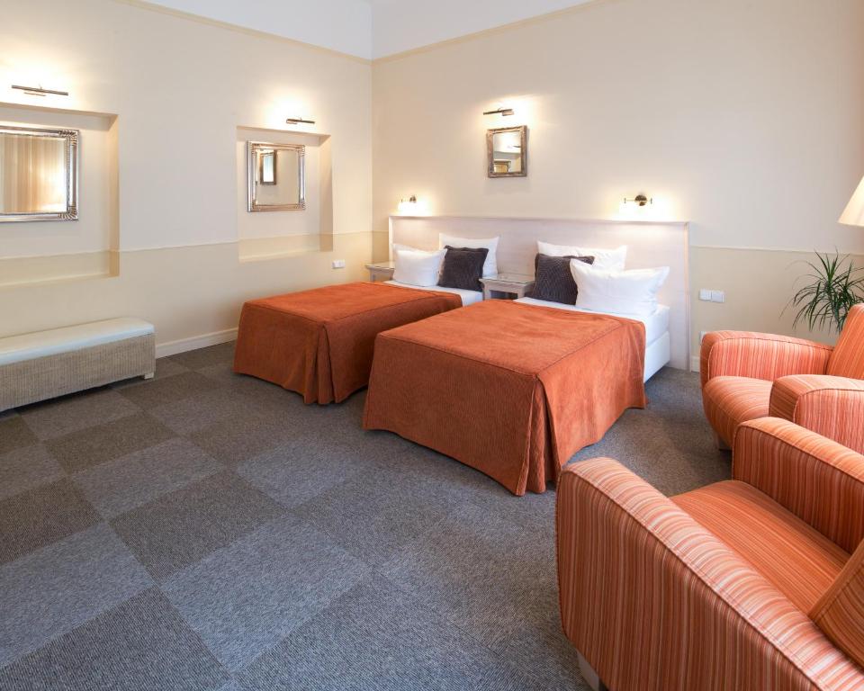 Posezení v ubytování Unitas Hotel
