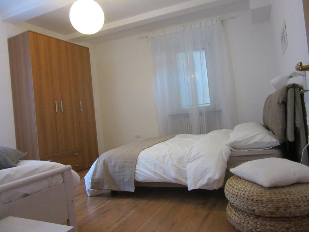 Un pat sau paturi într-o cameră la Portico88