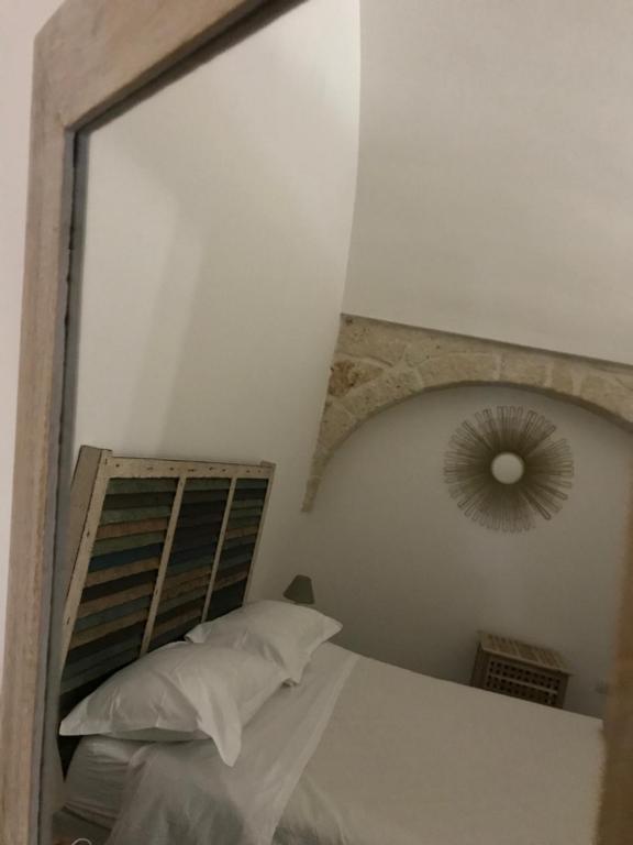 Postel nebo postele na pokoji v ubytování Zì Marì - Via Sirene