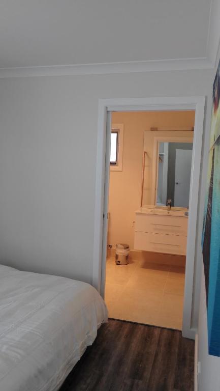 Postel nebo postele na pokoji v ubytování Dreamcatcher@Bicheno