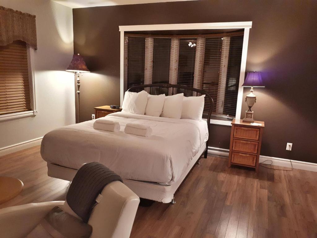 Una cama o camas en una habitación de Auberge des Berges