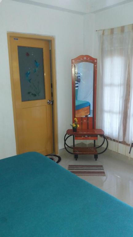 Postel nebo postele na pokoji v ubytování Mellow Homestay