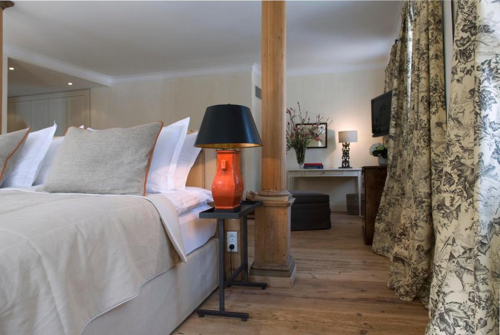 Postel nebo postele na pokoji v ubytování Brauereigasthof-Hotel Aying