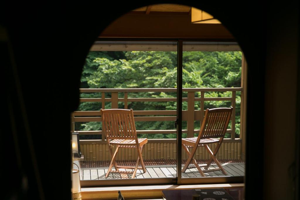 Balkón nebo terasa v ubytování Shima-Onsen Toshimaya