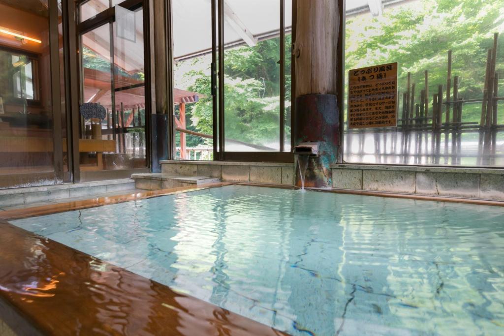 Bazén v ubytování Shima-Onsen Toshimaya nebo v jeho okolí
