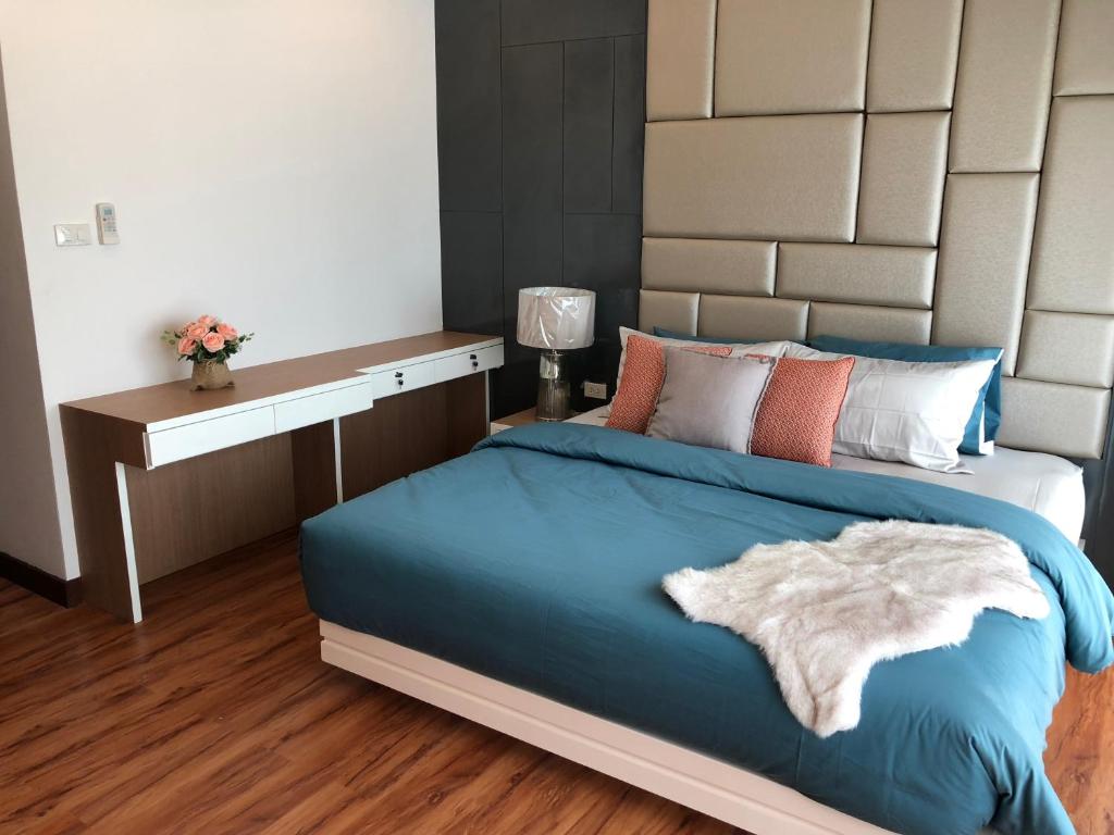 Postel nebo postele na pokoji v ubytování Samui Paca place