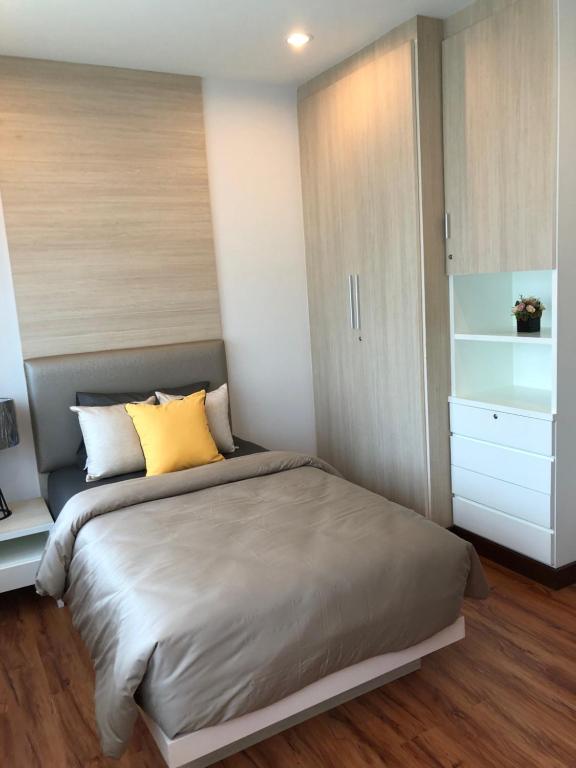 Postel nebo postele na pokoji v ubytování Samui Paca place