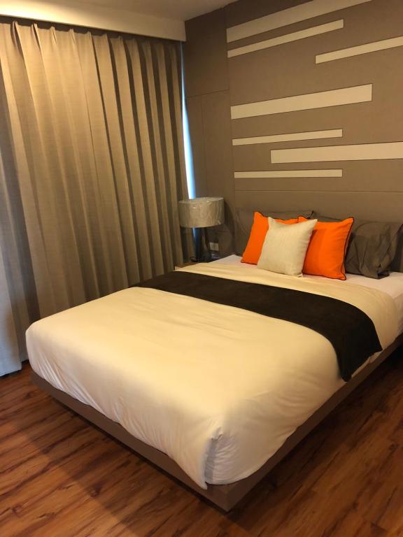 Postel nebo postele na pokoji v ubytování Samui Paca place