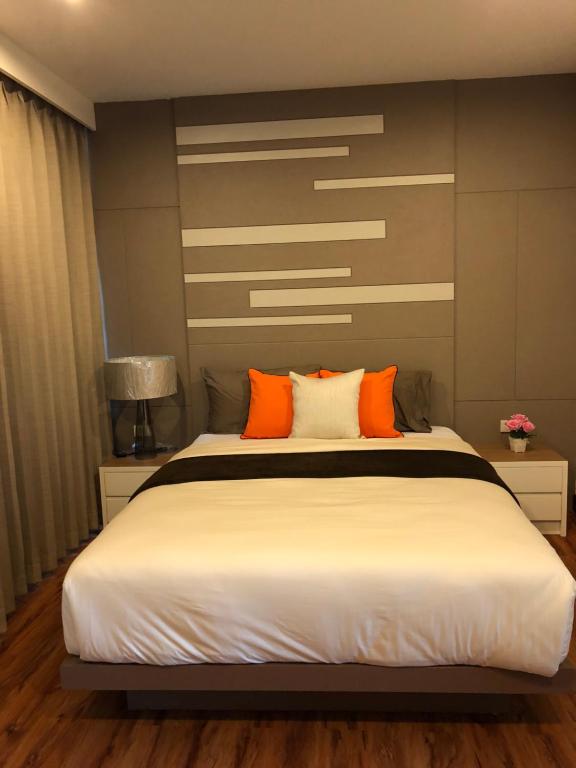 Postel nebo postele na pokoji v ubytování Samui Paca place
