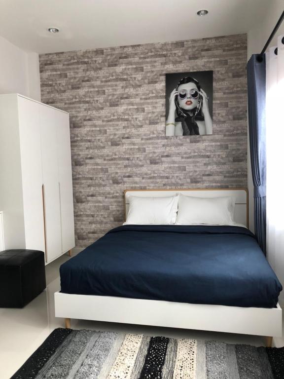 Postel nebo postele na pokoji v ubytování Samui Paca place
