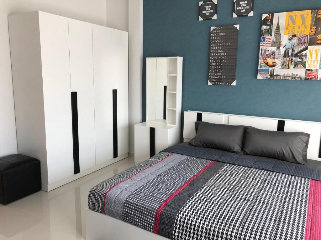 Postel nebo postele na pokoji v ubytování Samui Paca place