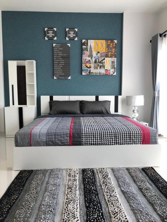 Postel nebo postele na pokoji v ubytování Samui Paca place