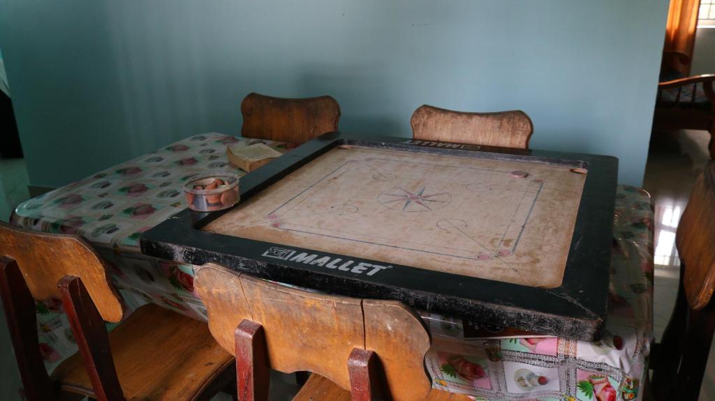 Postel nebo postele na pokoji v ubytování Cherish homestay