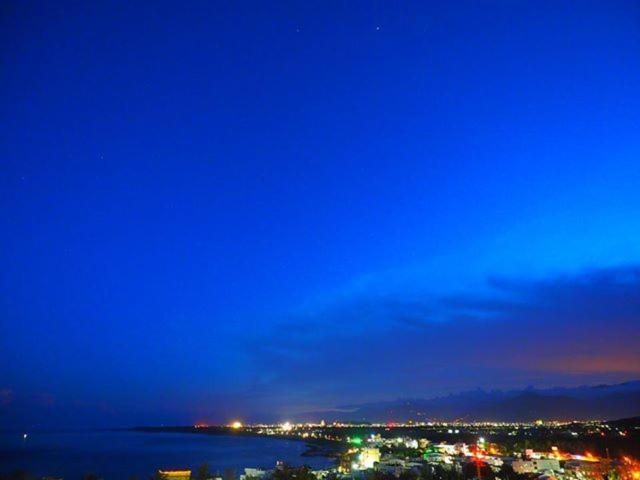 a view of a city at night with the sky at Fully One B&amp;B in Taitung City