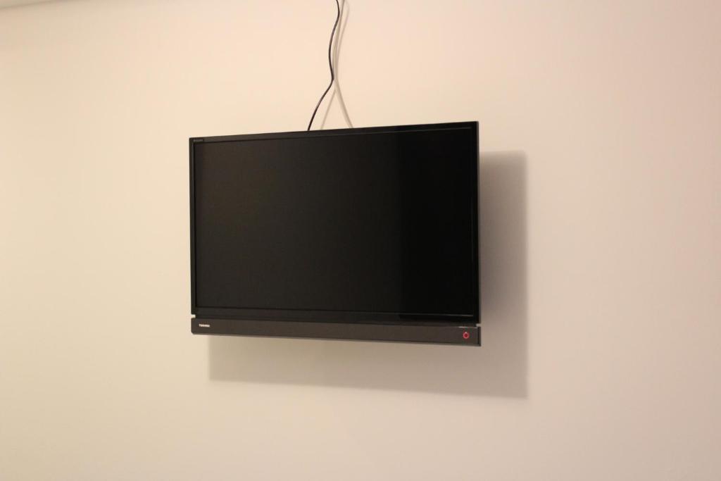 TV a/nebo společenská místnost v ubytování Nikko Station Hotel 2