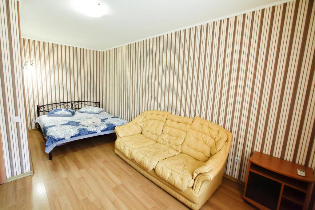 Un ou plusieurs lits dans un hébergement de l'établissement Botanic Apartments Pechersk