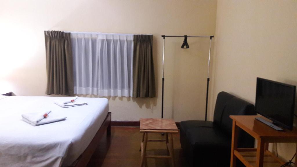 Postel nebo postele na pokoji v ubytování Kurumi Hostel