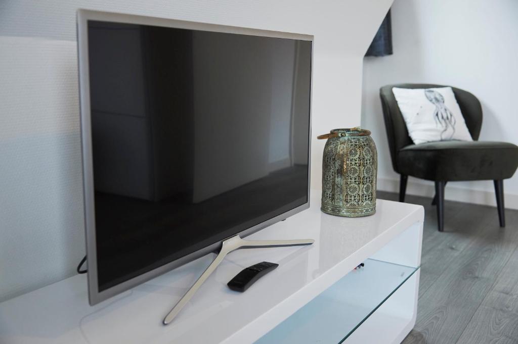 TV a/nebo společenská místnost v ubytování Harlingen oldtown apartment