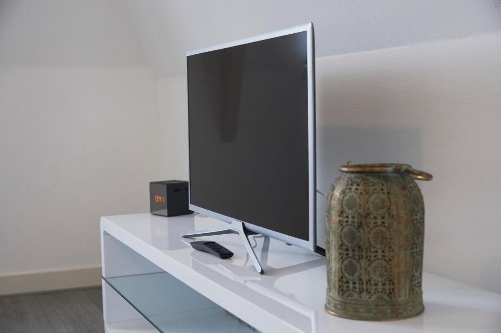 TV a/nebo společenská místnost v ubytování Harlingen oldtown apartment