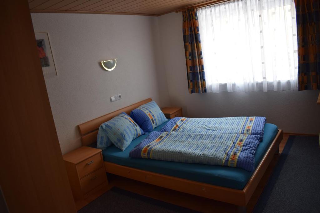 Poste&#x13E; alebo postele v izbe v ubytovan&iacute; Ferienhaus Schranz