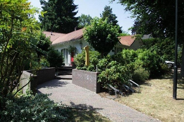 a house with a walkway in front of it at B n B nr. 1 in Apeldoorn