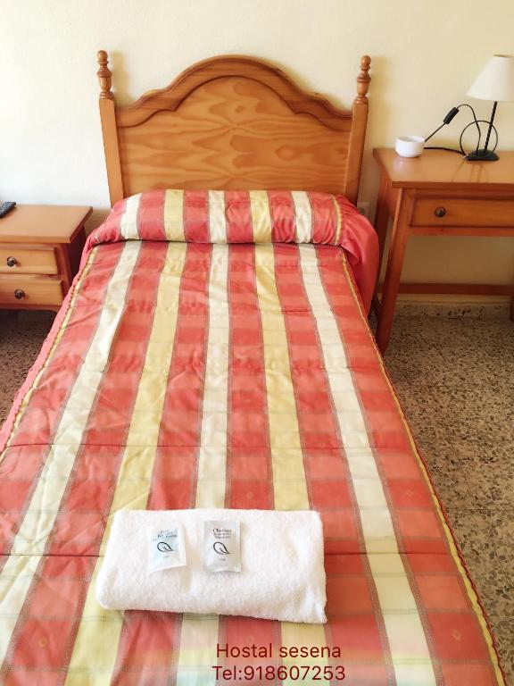 Postel nebo postele na pokoji v ubytování Hostal Seseña